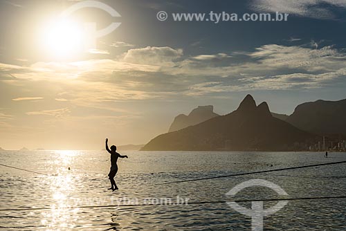  Practitioner of waterline - Arpoador Beach during the sunset  - Rio de Janeiro city - Rio de Janeiro state (RJ) - Brazil