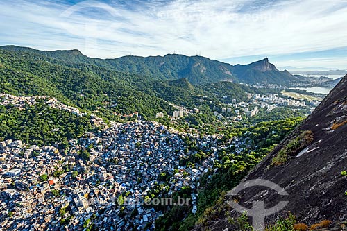  View of Rocinha Slum from Morro Dois Irmaos (Two Brothers Mountain) trail with the Christ the Redeemer (1931) in the background  - Rio de Janeiro city - Rio de Janeiro state (RJ) - Brazil