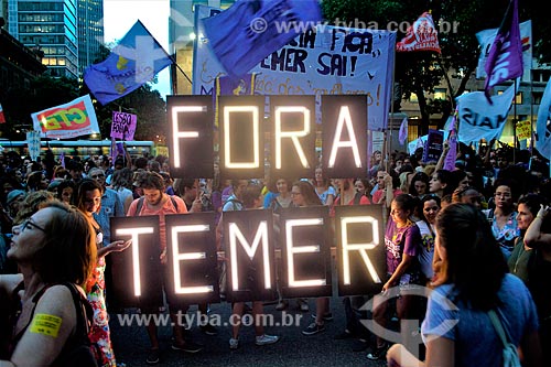  Illuminated placard that say: Get out Temer - during manifestation the International Womens Day  - Rio de Janeiro city - Rio de Janeiro state (RJ) - Brazil