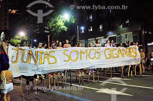  Stilt walker women holding poster that say: Neither Temer, Neither Trump - during manifestation the International Womens Day  - Rio de Janeiro city - Rio de Janeiro state (RJ) - Brazil