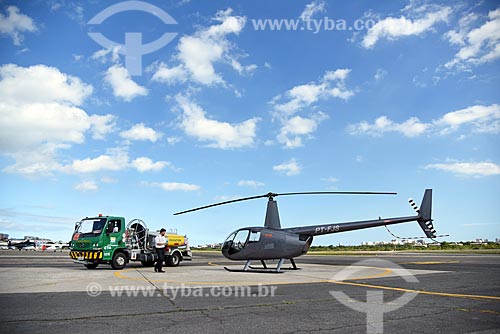 Helicopter and tanker truck - runway of the Comandante Nobre heliport  - Rio de Janeiro city - Rio de Janeiro state (RJ) - Brazil