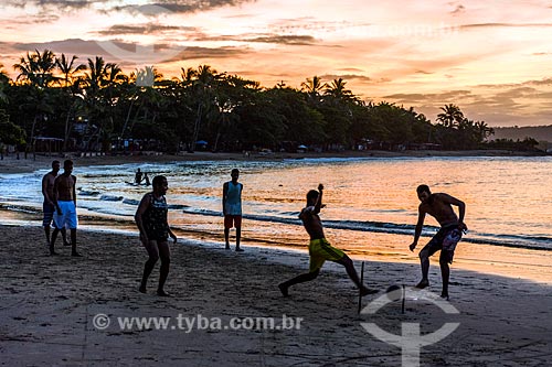  Man playing soccer - Conchas Beach waterfront during the sunset  - Itacare city - Bahia state (BA) - Brazil