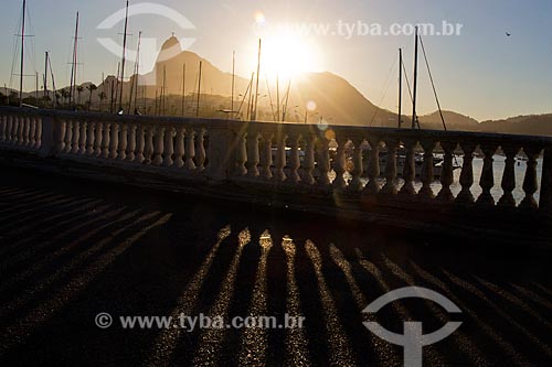  View of the sunset from short wall of Urca with the Christ the Redeemer in the background  - Rio de Janeiro city - Rio de Janeiro state (RJ) - Brazil