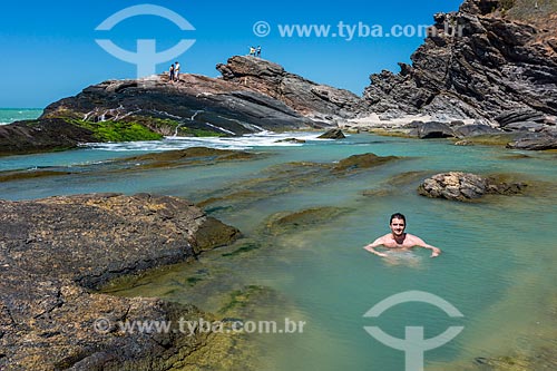  Bather - natural pool - formation known as Lagoinha (Little Lagoon) - waterfront of the Armacao dos Buzios city  - Armacao dos Buzios city - Rio de Janeiro state (RJ) - Brazil