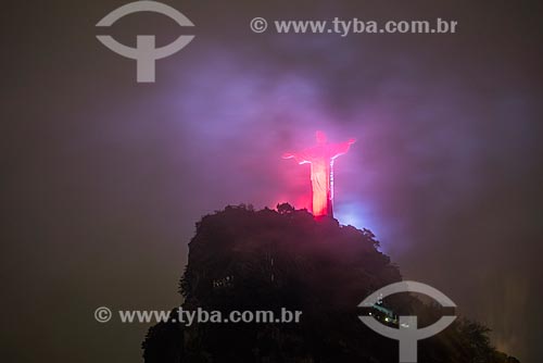  Christ the Redeemer (1931) Monument with special lighting - red - due to the National Day to Combat Vascular Disease  - Rio de Janeiro city - Rio de Janeiro state (RJ) - Brazil