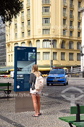  Woman reading Tourist information panel - Cinelandia Square  - Rio de Janeiro city - Rio de Janeiro state (RJ) - Brazil
