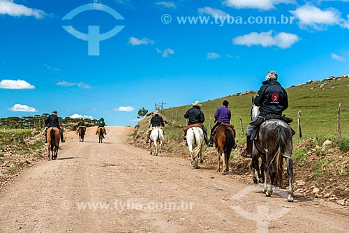  People on horseback - dirt road near to Sao Jose dos Ausentes city  - Sao Jose dos Ausentes city - Rio Grande do Sul state (RS) - Brazil