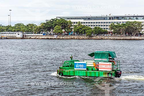  View of ecoboat - boat with equipment that collects floating solid waste in the water - near to Marina da Gloria (Marina of Gloria)  - Rio de Janeiro city - Rio de Janeiro state (RJ) - Brazil