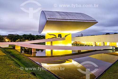  Facade of the Oscar Niemeyer Museum during the nightfall  - Curitiba city - Parana state (PR) - Brazil