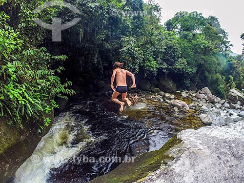  Man jumping - Verde Well (Green Well) - near to Visitors Center von Martius - Serra dos Orgaos National Park  - Guapimirim city - Rio de Janeiro state (RJ) - Brazil