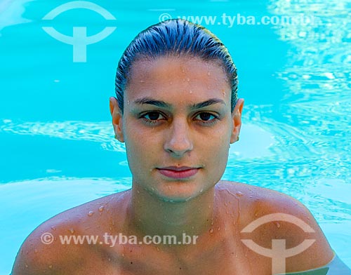  Detail of face of young woman in swimming pool  - Guarani city - Minas Gerais state (MG) - Brazil