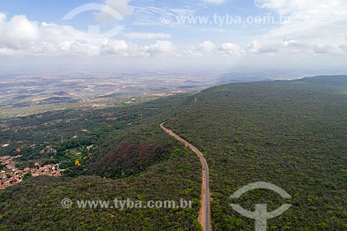  Picture taken with drone of the Araripe-Apodi National Forest with the CE-060 highway - also known as Padre Cicero highway  - Barbalha city - Ceara state (CE) - Brazil
