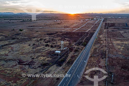  Picture taken with drone of the Governor Antonio Mariz Highway (BR-230) - snippet of Transamazonica Highway - during the sunset  - Sousa city - Paraiba state (PB) - Brazil