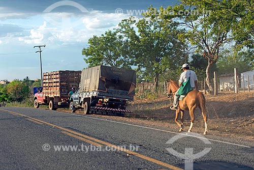  Man on horseback - kerbside of the CE-384 highway  - Mauriti city - Ceara state (CE) - Brazil