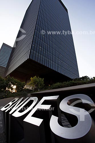  Logo with the build of the National Bank for Economic and Social Development (BNDES) headquarters in the background  - Rio de Janeiro city - Rio de Janeiro state (RJ) - Brazil