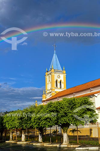  View of Divine Holy Spirit Mother Church with rainbow in dusk  - Guarani city - Minas Gerais state (MG) - Brazil