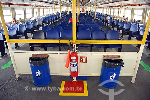  Detail of fire extinguisher and dumps inside of barge that makes crossing between Rio de Janeiro and Paqueta Island  - Rio de Janeiro city - Rio de Janeiro state (RJ) - Brazil