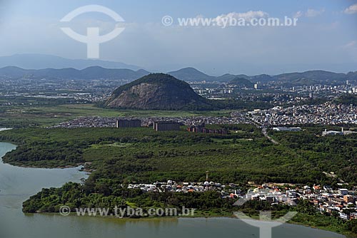  Aerial photo of the Rio das Pedras slum with the Rock of Panela in the background  - Rio de Janeiro city - Rio de Janeiro state (RJ) - Brazil