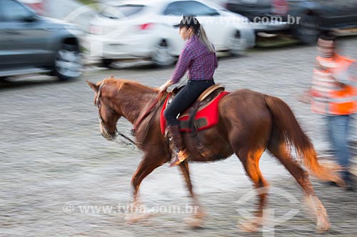  Woman riding a horse - Pirenopolis city historic center  - Pirenopolis city - Goias state (GO) - Brazil