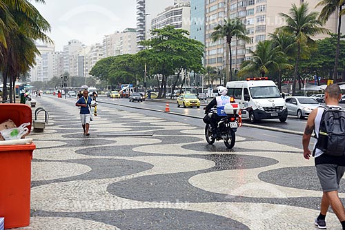  Motorcycle of Program Rio + Safe
Cyclist walking - boardwalk of Copacabana Beach waterfront  - Rio de Janeiro city - Rio de Janeiro state (RJ) - Brazil