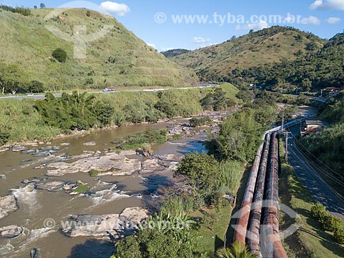  Picture taken with drone of dam of the Alberto Torres Hydroelectric Plant (1908) with the BR-040 highway to the left  - Areal city - Rio de Janeiro state (RJ) - Brazil