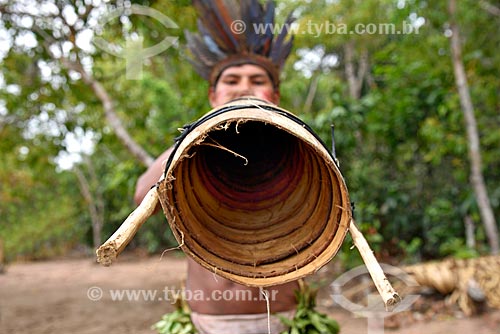  Detail of indian of Tatuyo tribe playing Jurupari Trumpet  - Amazonas state (AM) - Brazil