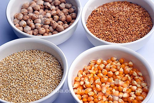  Detail of bowls with grains of chickpea, quinoa, golden linseed and corn for popcorn  - Brazil