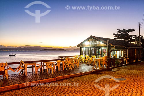  Pier of bar and restaurant - Barra do Sambaqui Beach waterfront during the sunset  - Florianopolis city - Santa Catarina state (SC) - Brazil