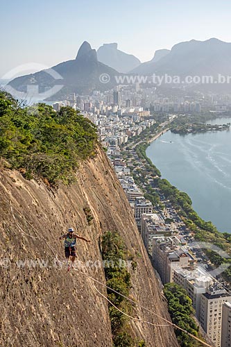  Practitioner of slackline - Cantagalo Hill with the Morro Dois Irmaos (Two Brothers Mountain) and the Rock of Gavea in the background  - Rio de Janeiro city - Rio de Janeiro state (RJ) - Brazil