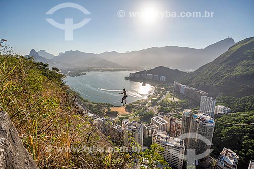  Practitioner of slackline - Cantagalo Hill with the Rodrigo de Freitas Lagoon in the background  - Rio de Janeiro city - Rio de Janeiro state (RJ) - Brazil