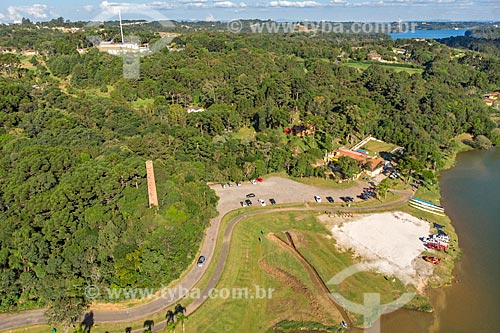  Picture taken with drone of the chimney of old pottery on the banks of the Passauna Park dam  - Curitiba city - Parana state (PR) - Brazil