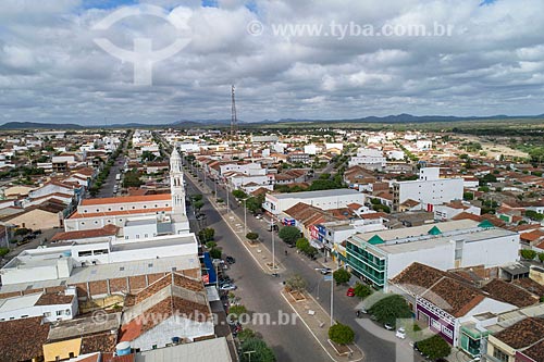  Picture taken with drone of the snippet of the Coronel Joao Santa Cruz Street with the Our Lady of Sorrows Church  - Monteiro city - Paraiba state (PB) - Brazil