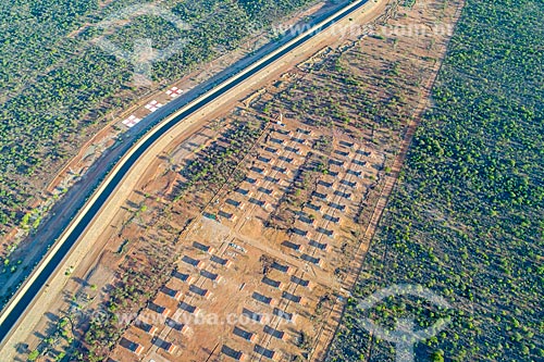  Picture taken with drone of channel of the Project of Integration of Sao Francisco River with the watersheds of Northeast setentrional - north axis - with housing estate for residents affected by the construction of the canal  - Cabrobo city - Pernambuco state (PE) - Brazil