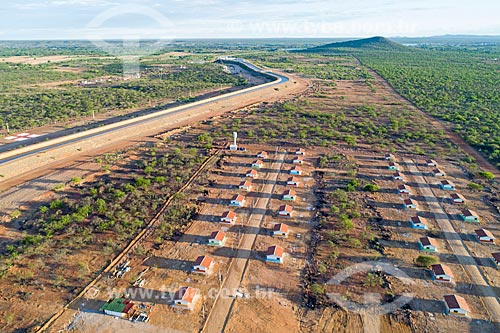  Picture taken with drone of channel of the Project of Integration of Sao Francisco River with the watersheds of Northeast setentrional - north axis - with housing estate for residents affected by the construction of the canal  - Cabrobo city - Pernambuco state (PE) - Brazil