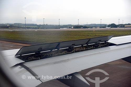  Detail of airplane wing with speed brake triggered - Viracopos International Airport  - Campinas city - Sao Paulo state (SP) - Brazil