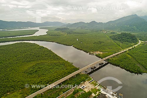  Picture taken with drone of the bridge of the Doutor Manuel Hipolito Rego Highway (SP-055) over of the Itapanhau River - Bertiogas Restinga State Park  - Bertioga city - Sao Paulo state (SP) - Brazil