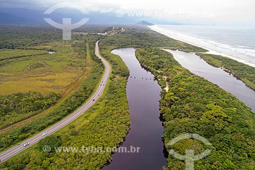  Picture taken with drone of the Doutor Manuel Hipolito Rego Highway (SP-055) with the Itaguare River - Bertiogas Restinga State Park  - Bertioga city - Sao Paulo state (SP) - Brazil