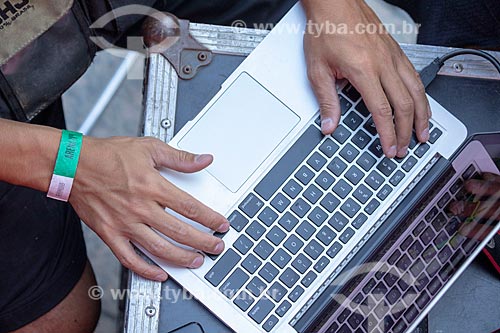  Detail of journalist with laptop - Olympic Boulevard during the match between Brazil x Belgium - World cup 2018 - game in which Brazil was eliminated  - Rio de Janeiro city - Rio de Janeiro state (RJ) - Brazil
