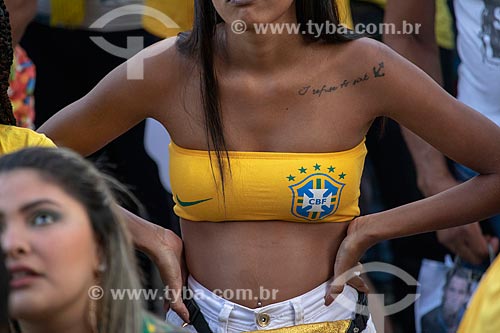  Detail of woman cheering for Brazilian team - Olympic Boulevard during the match between Brazil x Belgium - World cup 2018 - game in which Brazil was eliminated  - Rio de Janeiro city - Rio de Janeiro state (RJ) - Brazil