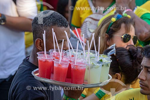  Detail of tray of street vendor amid the Brazilian team soccer fans - Olympic Boulevard during the match between Brazil x Belgium - World cup 2018 - game in which Brazil was eliminated  - Rio de Janeiro city - Rio de Janeiro state (RJ) - Brazil