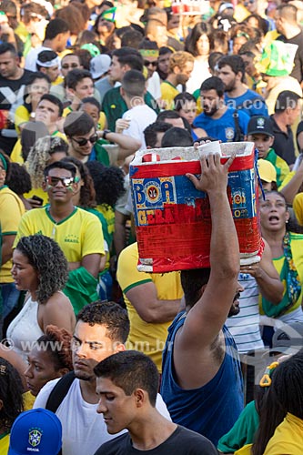  Detail of street vendor amid the Brazilian team soccer fans - Olympic Boulevard during the match between Brazil x Belgium - World cup 2018 - game in which Brazil was eliminated  - Rio de Janeiro city - Rio de Janeiro state (RJ) - Brazil