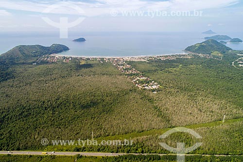  Picture taken with drone of the Doutor Manuel Hipolito Rego Highway (SP-055) with the Baleia Beach in the background  - Sao Sebastiao city - Sao Paulo state (SP) - Brazil