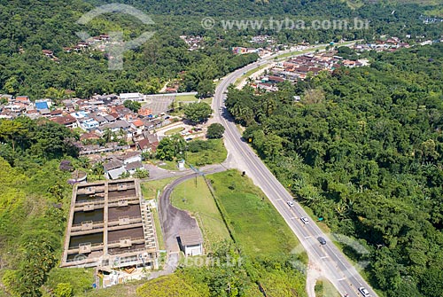 Picture taken with drone of the Doutor Manuel Hipolito Rego Highway (SP-055) with the Juquei Sewage Treatment Station  - Sao Sebastiao city - Sao Paulo state (SP) - Brazil