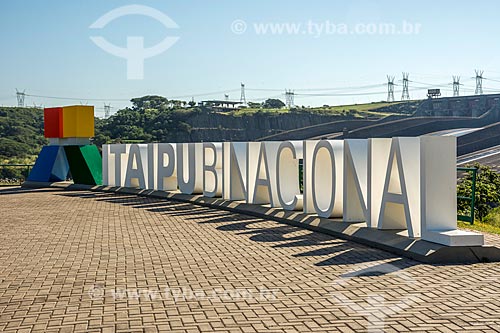  View of placard that says: Itaipu Binacional - Itaipu Hydrelectric Plant  - Foz do Iguacu city - Parana state (PR) - Brazil