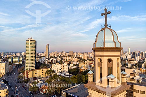  Picture taken with drone of belfry of the Our Lady of Mercy Church with buildings from the city center of Curitiba in the background  - Curitiba city - Parana state (PR) - Brazil