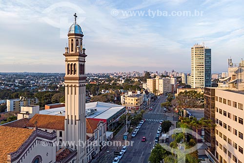  Picture taken with drone of belfry of the Our Lady of Mercy Church with buildings from the city center of Curitiba in the background  - Curitiba city - Parana state (PR) - Brazil