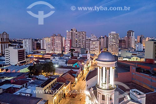  Picture taken with drone of the Independent Presbyterian Church of Curitiba during the nightfall with buildings from the city center of Curitiba in the background  - Curitiba city - Parana state (PR) - Brazil