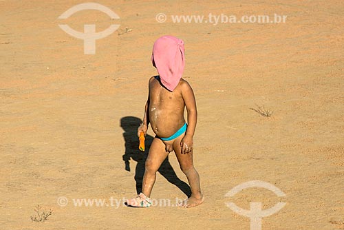 Indigenous boy hiding the face - Aiha village of the Kalapalo tribe - INCREASE OF 100% OF THE VALUE OF TABLE  - Querencia city - Mato Grosso state (MT) - Brazil