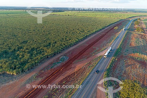  Picture taken with drone of snippet of the BR-070 highway during the sunset  - Montes Claros de Goias city - Goias state (GO) - Brazil