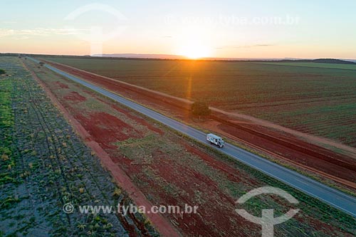  Picture taken with drone of snippet of the BR-070 highway during the sunset  - Montes Claros de Goias city - Goias state (GO) - Brazil